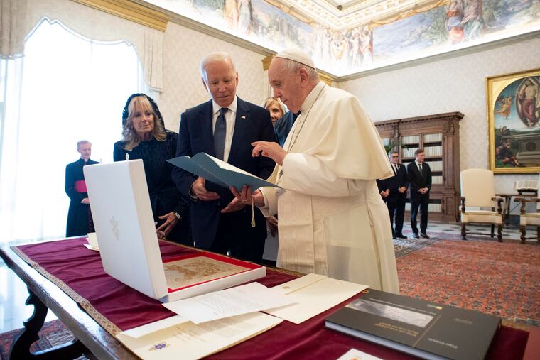 This handout picture provided by the Vatican Media shows Pope Francis during an audience with U.S. President Joe Biden, accompanied by his wife and entourage, in Vatican City on Friday, Oct. 29 2021.