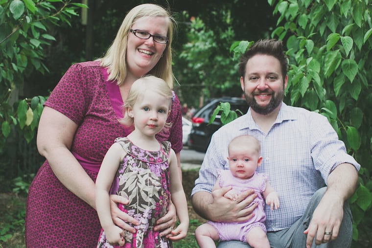 Susan and Phillip Crosby with daughter Emme and baby Millie.