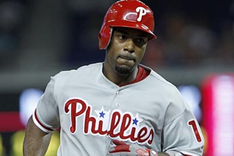 "I was already out of it. Mentally just upset," Jimmy Rollins said. (Wilfredo Lee/AP)