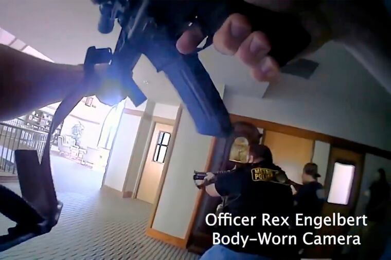 This image provided by Metropolitan Nashville Police Department shows bodycam footage of police responding to an active shooting at The Covenant School in Nashville, Tenn., on Monday.