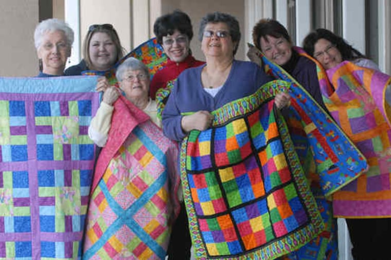 From left, Stella Quedenfeld, Christina Katzaman, Jeanette Clark, Becky Jones, Ann Bilda, Barbara "B.J." Rieck, founder Linda Arye at the Quilting Circle in Bensalem.