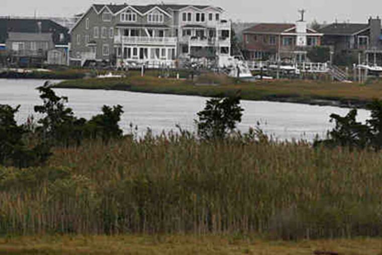 In the Avalon area, the bridge on Avalon Boulevard overlooks properties on 21st Street. The downturn is worse elsewhere. (Elizabeth Robertson/Staff)