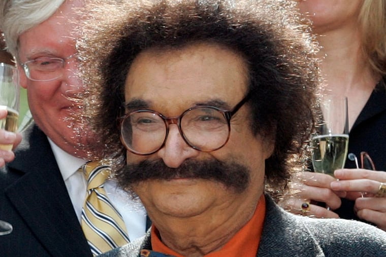 In this May 31, 2006, photo, film critic Gene Shalit is seen during a toast with "Today" show cast and crew at the end of Katie Couric's final show, in New York.