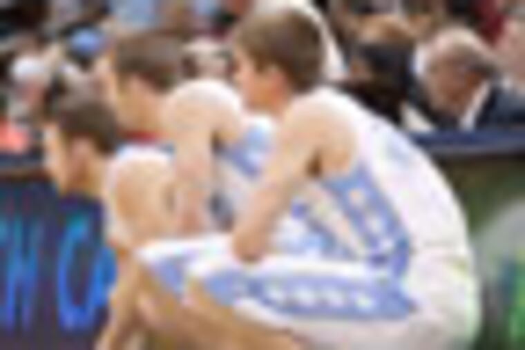 VITEZ13-A - three "blue steel walk-ons patrick crouch, david dupont and stewart cooper prepare to enter Friday's game against Maryland in the last minute, with North Carolina way ahead!
Please credit:
J.D. Lyon Jr./UNC