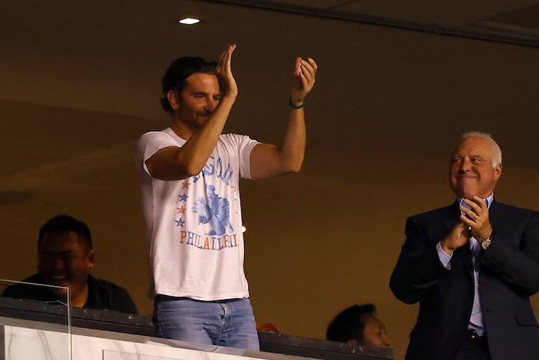 Actor Bradley Cooper (left) joined Eagles Chairman and CEO Jeffrey Lurie at a Sept. 19 game against the Minnesota Vikings.