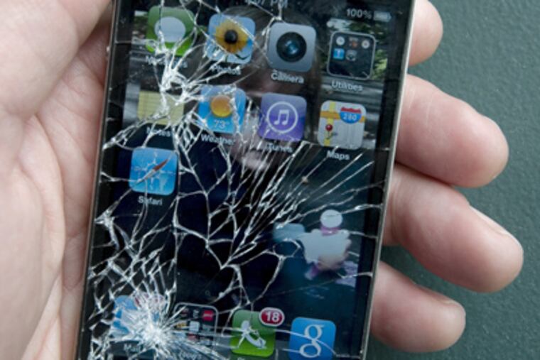 An iPhone with a cracked screen. A Pennsylvania lawmaker is proposing legislation that would force manufacturers to allow consumers to repair their broken devices without having to depend on the manufacturer for costly fixes.