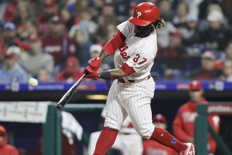 Phillies Odubel Herrera hits a sixth-inning solo home run against the Atlanta Braves on Friday, April 27, 2018 in Philadelphia.