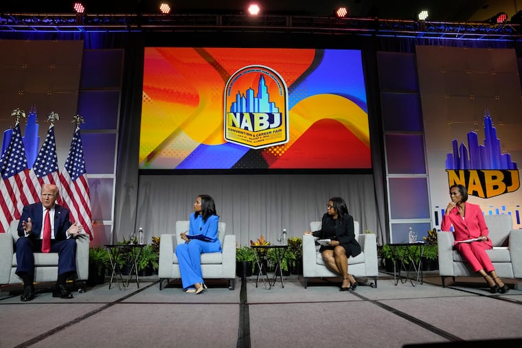 Republican presidential candidate Donald Trump, left, speaks at the National Association of Black Journalists' convention, Wednesday, July 31, 2024, in Chicago. Trump's interview was moderated by from left, ABC's Rachel Scott, Semafor's Nadia Goba and FOX News' Harris Faulkner, .