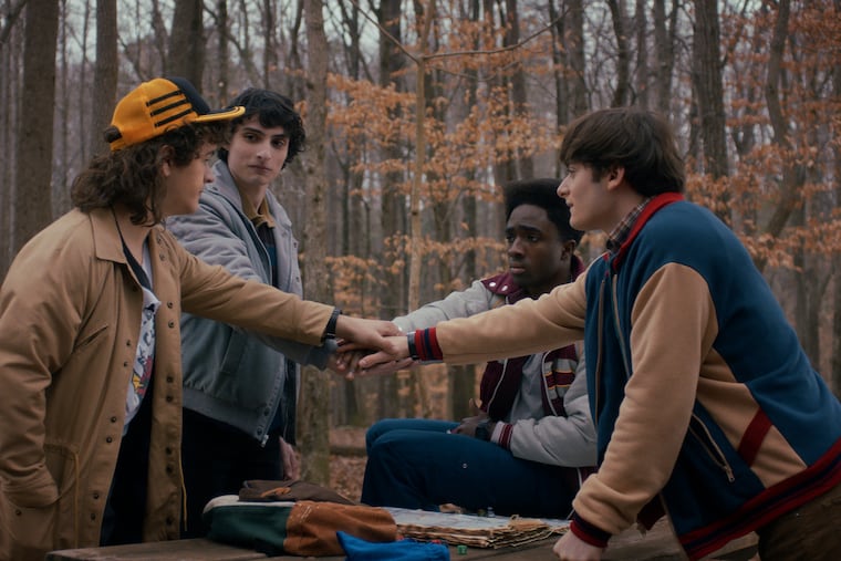 From left, Gaten Matarazzo as Dustin Henderson, Finn Wolfhard as Mike Wheeler, Caleb McLaughlin as Lucas Sinclair, and Noah Schnapp as Will Byers in “Stranger Things,” Season 5. MUST CREDIT: Netflix