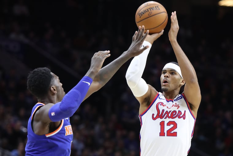 Tobias Harris of the Sixers shoots above Bobby Portis of the Knicks during the first half at the Wells Fargo Center.