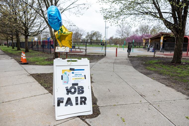 A sign for a job fair at Mander Playground in Philadelphia, Pa., on Saturday, April 12, 2025.
