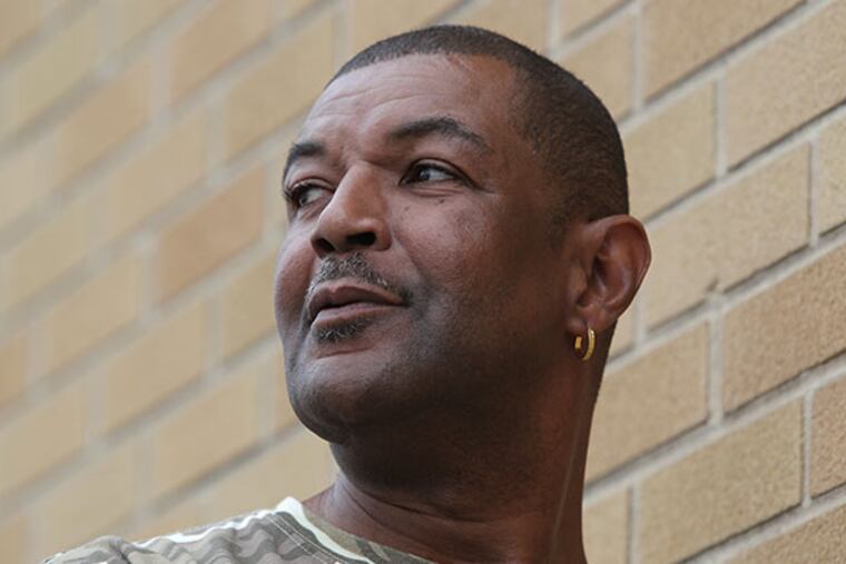 Victor Anderson, a program participant who lived years on the street and is now in his own apartment, is seen at the Pathways to Housing office in Philadelphia on April 14, 2014. ( DAVID MAIALETTI / Staff Photographer )