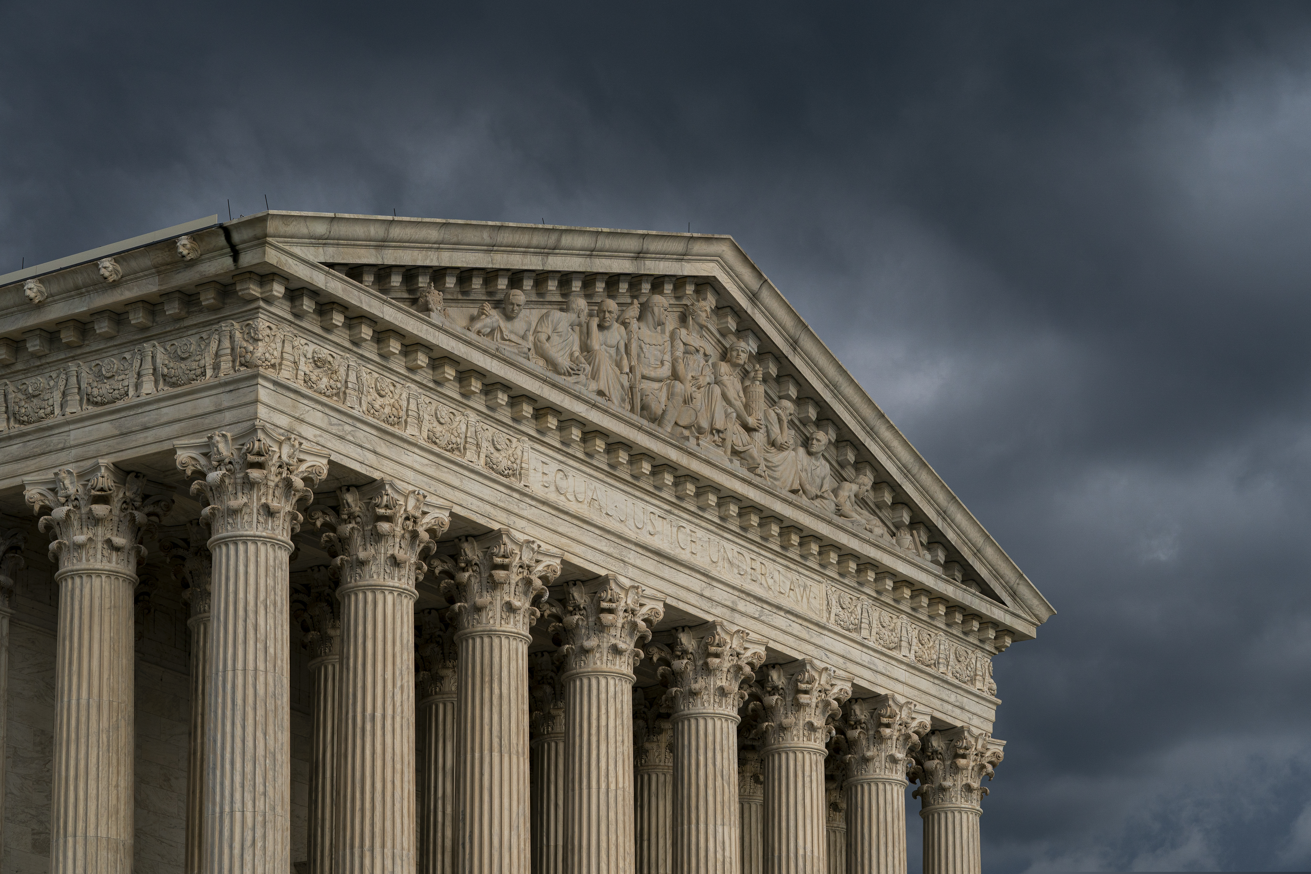 The Supreme Court is seen under stormy skies in Washington.