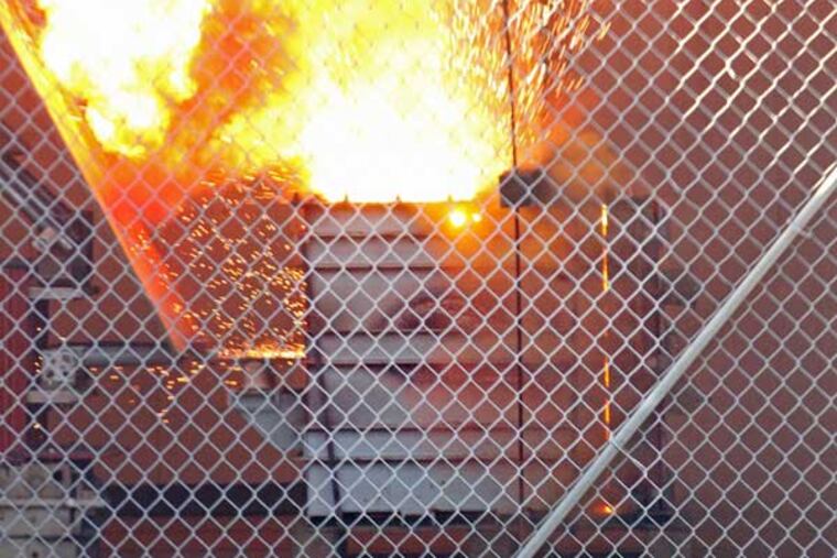 An explosion and fireball at KEMA-Powertest lab in Chalfont, the largest independent highpower electrical-testing facility in America, is all in a day's work. (Michael Bryant / Staff Photographer)