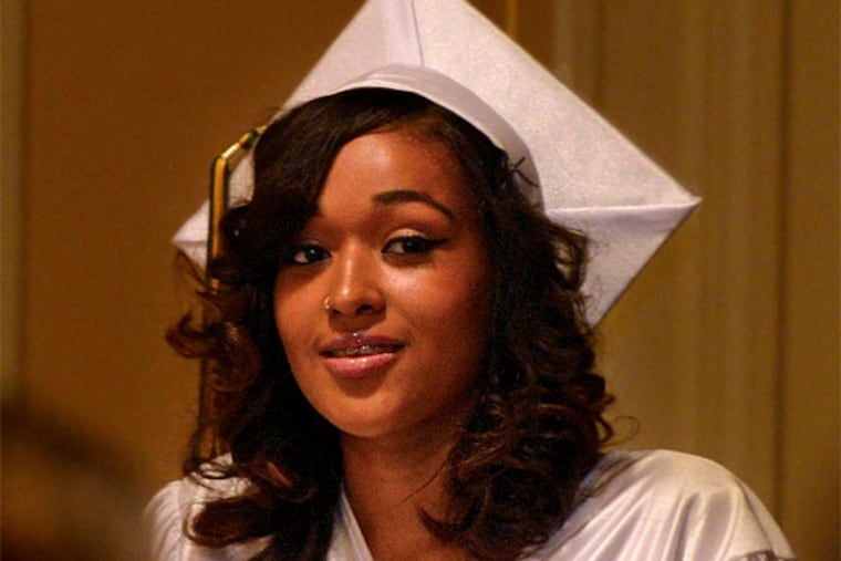 Valery Swope , at her high school graduation last month, is headed to Cabrini College. "I want to shout from the rooftop that Valery made it!" a DHS worker says.