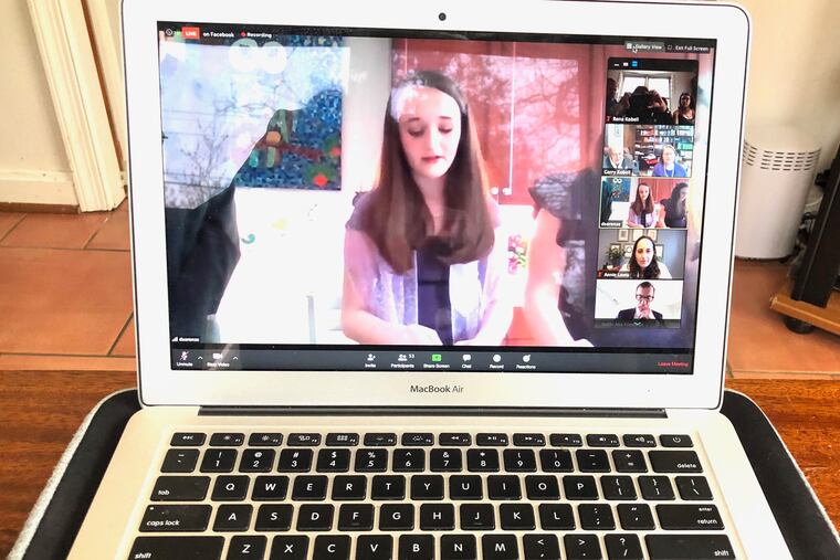 Thirteen-year-old Eve Kobell leads prayers at her Zoom Bat Mitzvah at her Philadelphia congregation Temple Beth Zion-Beth Israel.