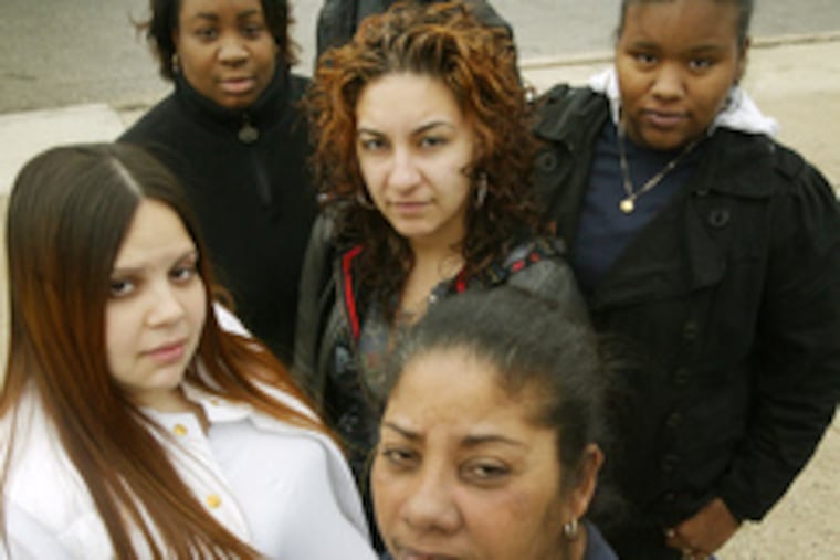 Parent truant officers facing program's end: (front) Maria Coreano; (left to right) Zaira Gonzalez, Margarita Nieves, Sylvia Perez & Maria Norales. At rear is a supervisor, Gilbert Rodriguez.