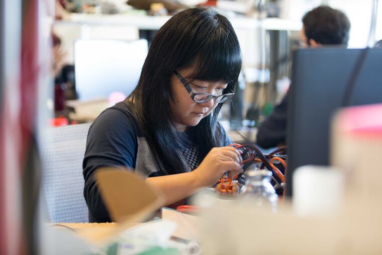 File photo: Feifei Qian works on a project as part of her postdoctoral research in the robotics lab in Pennovation October 7, 2016. The Pennovation Center is home to research labs, business and entrepreneurial offices, and educational facilities.