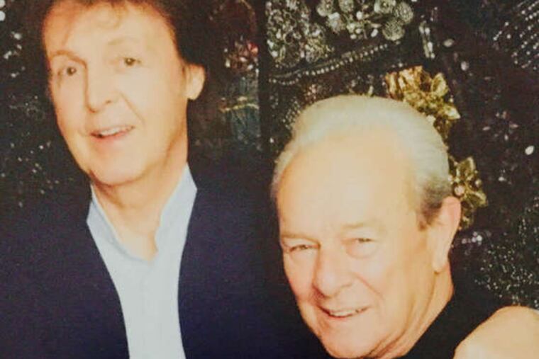 With a little help from a Philly friendLocal rock pioneer Charlie Gracie met with Paul McCartney before McCartney's show at the Wells Fargo Center in June. In this photo just released by McCartney's organization, the two rockers have a copy of Gracie's new autobiography, "Rock and Roll's Hidden Giant," which contains a forward by McCartney that attests to the South Philadelphia native's influence on the Beatles. MLP Communications