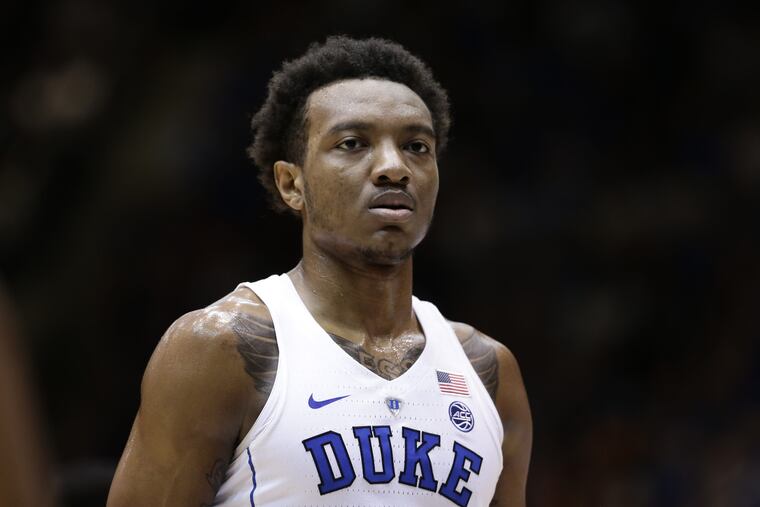 Duke's Wendell Carter Jr. pauses during a break in action against Syracuse during the first half of an NCAA college basketball game in Durham, N.C., Saturday, Feb. 24, 2018. (AP Photo/)