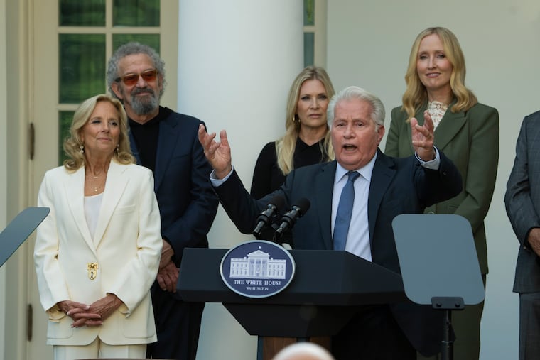 First lady Jill Biden (left) listens to actor Martin Sheen speak at an event in the Rose Garden on Sept. 20 to mark the 25th anniversary of the television series "The West Wing."