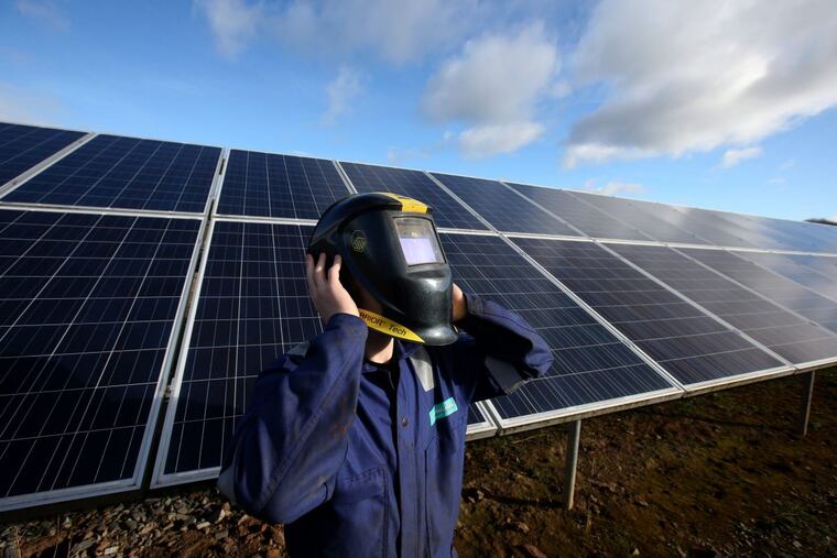 Aidan Legge views a 2015 solar eclipse in Scotland using a welding mask.