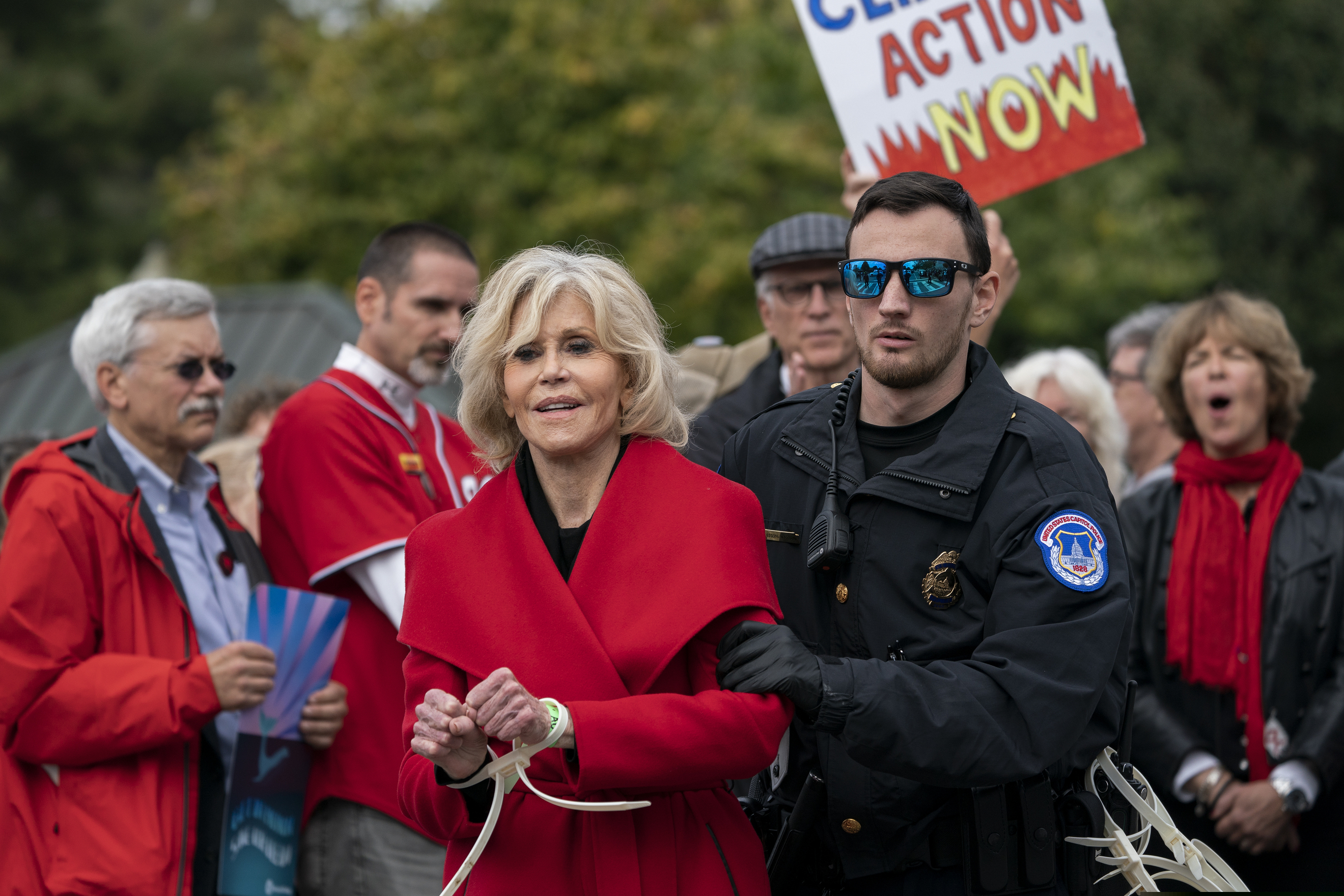 FILE - In this Friday, Oct. 25, 2019, file photo, actress and activist Jane Fonda is arrested at the Capitol for blocking the street after she and other demonstrators called on Congress for action to address climate change, in Washington. Fonda spent a night in a Washington, D.C., jail after her fourth arrest in as many weeks during a climate change demonstration on Capitol Hill. The 81-year-old Oscar winner was among more than 40 people arrested Friday, Nov. 1, while sitting inside a Senate office building. (AP Photo/J. Scott Applewhite, File)