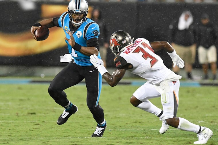 Former Carolina Panthers quarterback Cam Newton (1) is a free agent, and he's ready to prove himself. (David T. Foster III/Charlotte Observer/TNS)