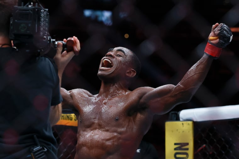 Jeremiah Wells celebrates his victory over Myktybek Orolbai during UFC 330 at the Xfinity Mobile Arena on Saturday.