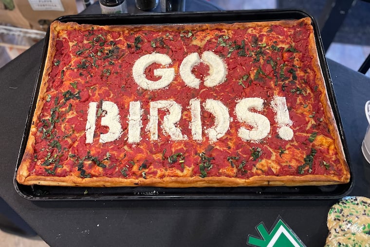A "Go Birds!" tomato pie from Carlino's Market in Ardmore is ready for game day.
