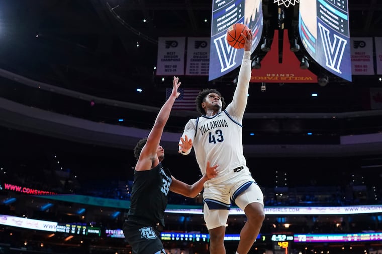 Villanova's Eric Dixon, here in a February game against Marquette, broke the school record for career scoring with 2,244 career points.