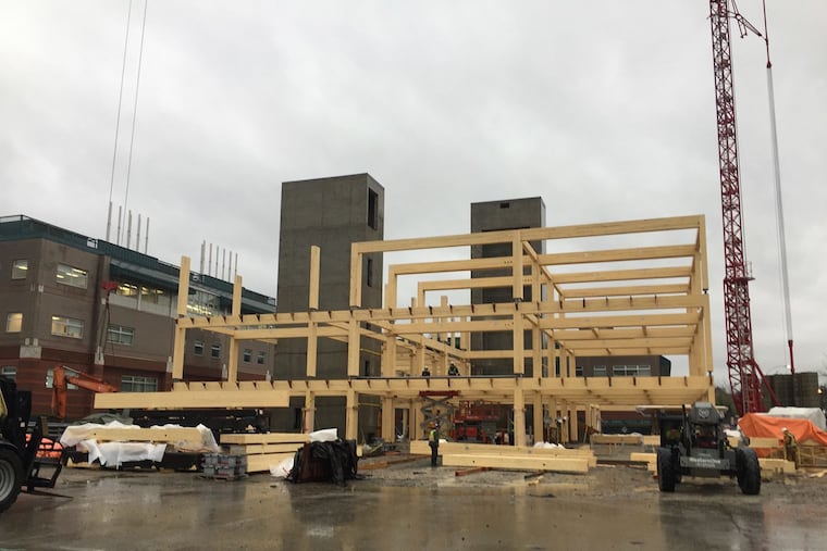 Construction of the four-story CLT hybrid Wilson School of Design in Richmond, British Columbia. The building went up last year; these photos show the glue-laminated post-and-beam framing on concrete foundation. Later, cross-laminated timber decking and glass curtain walls were added.