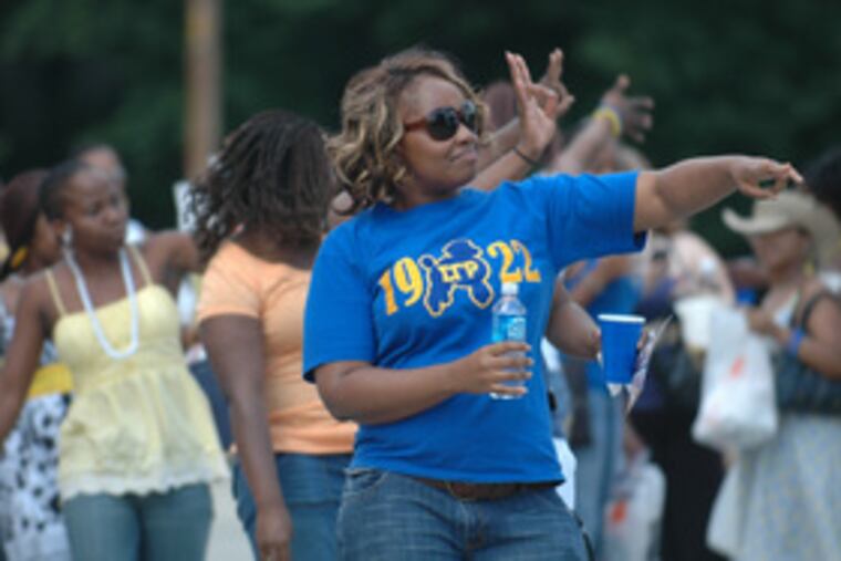 Nuah Gweh leads Sigma Gamma Rho sisters in a stroll last year.