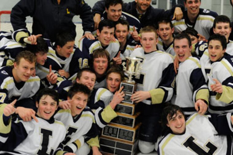 La Salle celebrates their win over Holy Ghost Prep to take the Flyers Cup Class AAA championship. (Ron Tarver / Staff Photographer)
