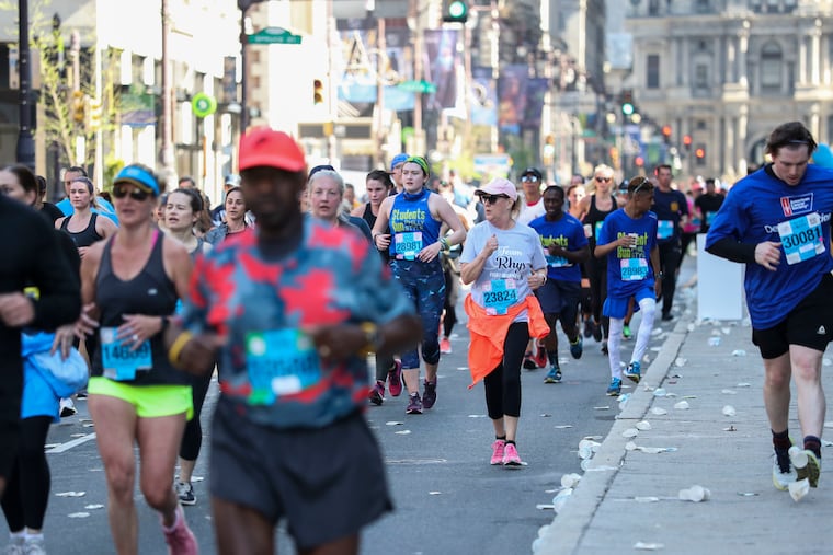 Participants race down Broad Street during the 10 mile Blue Cross Broad Street Run in Philadelphia, Pa. on Sunday, May 1, 2022. The 2020 race was canceled and the 2021 race was postponed. On Sunday, 27,500 runners were expected to participate.