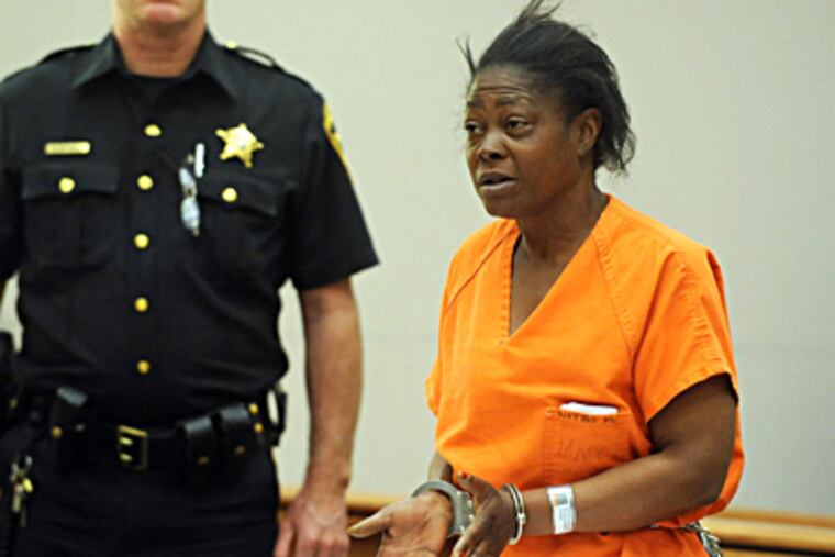 Antoinette Pelzer responds during her arraignment Tuesday in court in Atlantic County on charges that she stabbed two Canadian women on Monday outside of Bally’s Atlantic City. DANNY DRAKE / Press of Atlantic City