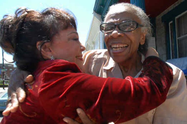 Kathleen "Bunny" Gibson visits Billie Williams (right) in West Philadelphia. Gibson once danced on the show; Williams could only watch from home.