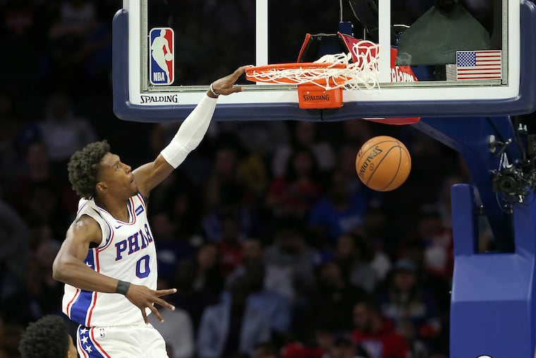 Josh Richardson of the Sixers dunks against the Pistons during the 2nd half of their NBA preseason game at the Wells Fargo Center on Oct.15, 2019.