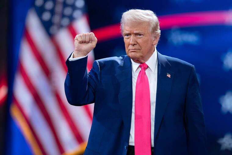 President Donald Trump gestures to the crowd at the Conservative Political Action Conference, CPAC, at the Gaylord National Resort & Convention Center, Saturday, Feb. 22, 2025, in Oxon Hill, Md.