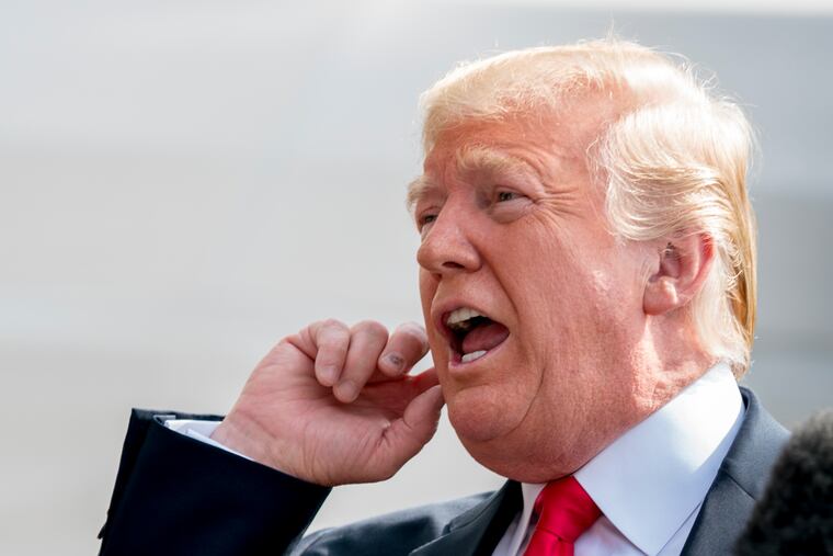 President Donald Trump speaks to members of the media before boarding Marine One on the South Lawn of the White House in Washington, Friday, Aug. 17, 2018, for a short trip to Andrews Air Force Base, Md., and then on to Southampton, N.Y., for a fundraiser.