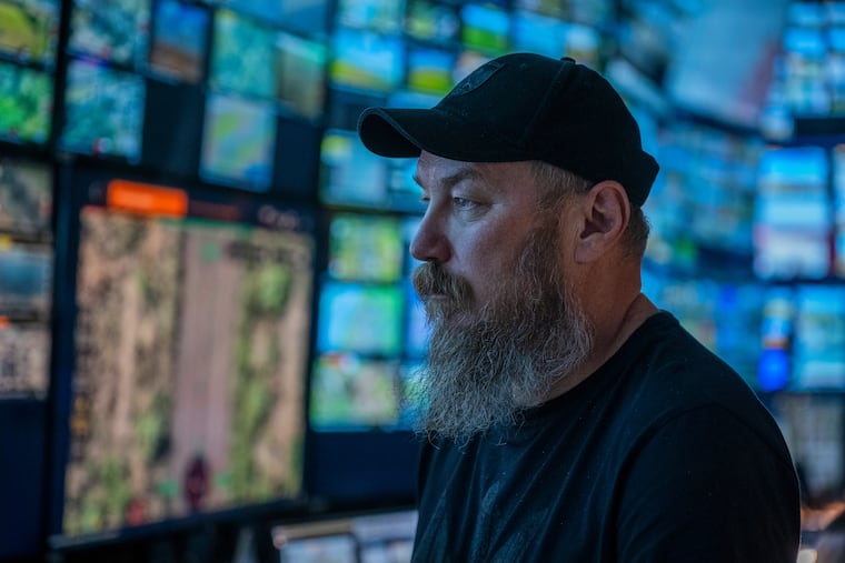 Maj. Robert "Magyar" Brovdi stands in the control room during a long-range unmanned aerial vehicle operation targeting Russian positions in an undisclosed location in Ukraine on Friday, Aug. 7, 2026.