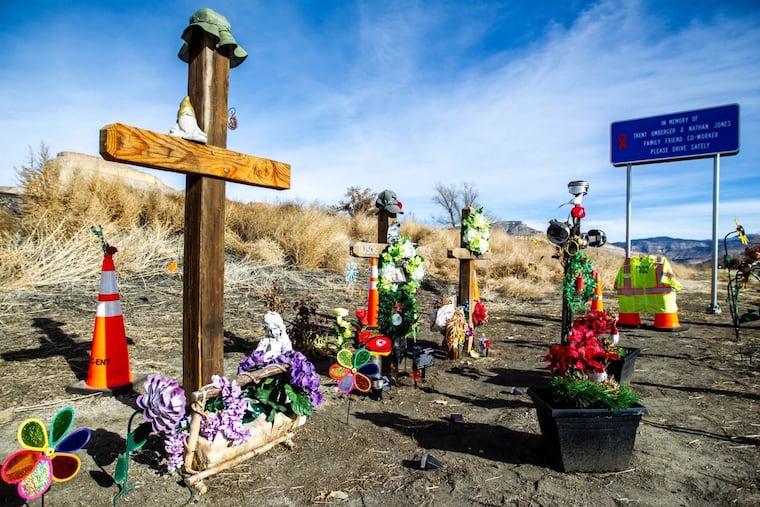A memorial on the side of U.S. Highway 6 near Palisade, Colorado, marks where a vehicle struck two state transportation workers who were replacing a sign in September 2024. The driver had oxycodone and THC, the psychoactive compound in marijuana, in his system at the time of the crash, which killed the workers and the vehicle’s passenger. (Larry Robinson/The Daily Sentinel)