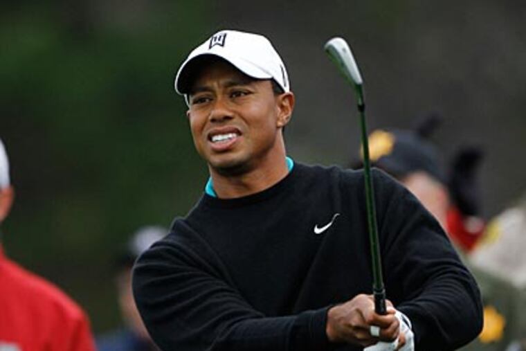 Tiger Woods struggled to make putts during the first round of the U.S. Open. (AP Photo / Matt Slocum)