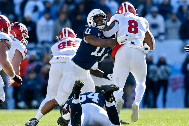 Penn State linebacker Micah Parsons (11) stopping Indiana running back Stevie Scott III (8) during the Nittany Lions' 34-27 victory.
