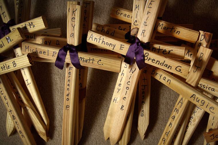 Valerie Fiore, of Warrington, started a project to put the names of drug overdose victims on crosses after the death of her son Anthony last year.