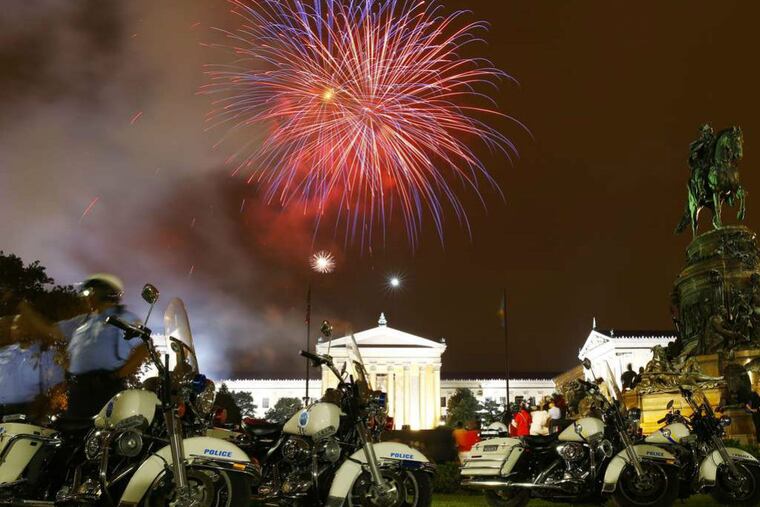 Red, white and blue streaks were mixed in with the fireworks over the Art Museum on July 4, but otherwise patriotism was conspicuously absent. (MATT ROURKE / ASSOCIATED PRESS)