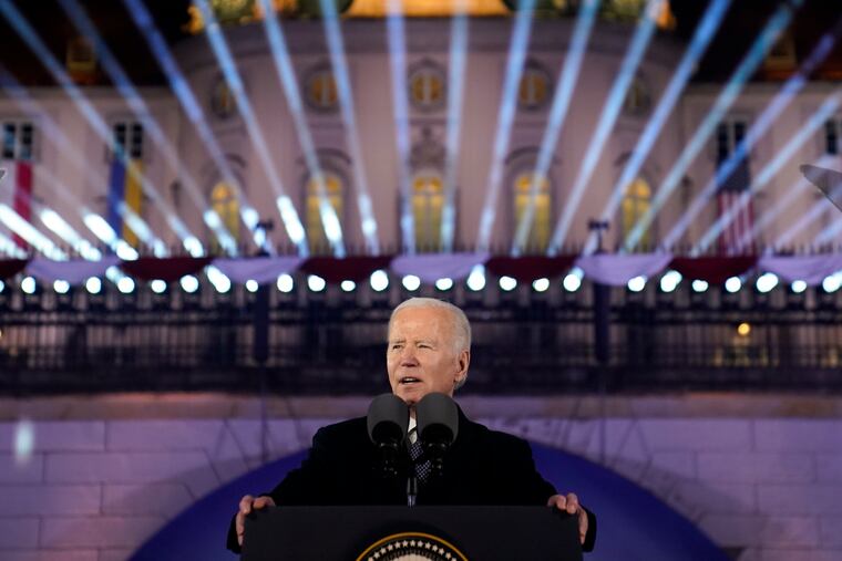 President Joe Biden delivers a speech marking the one-year anniversary of the Russian invasion of Ukraine on Tuesday at the Royal Castle Gardens in Warsaw.