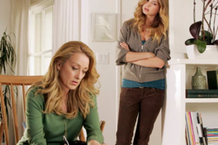 Patricia Wettig plays "the other woman" and Emily Van Camp is her daughter. Wettig's husband, Ken Olin, is an executive producer; their son is a writer; their daughter acted on three episodes.