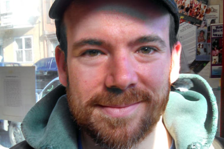 James Rizzo, 33, a temp worker, enrolled in health insurance Saturday at the Northern Liberties Community Center. He was a first-time buyer.