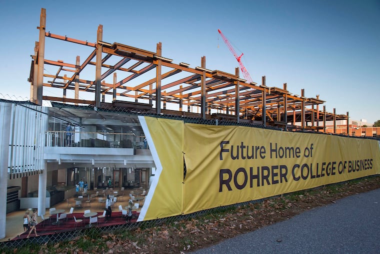 A new business school building under construction at Rowan University in 2015. Stockton University's first, failed plan for an Atlantic City campus at the Showboat site was driven by a desire to get ahead of Rowan.